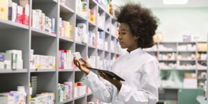 Buyer reviewing serum samples to choose a face serum manufacturer