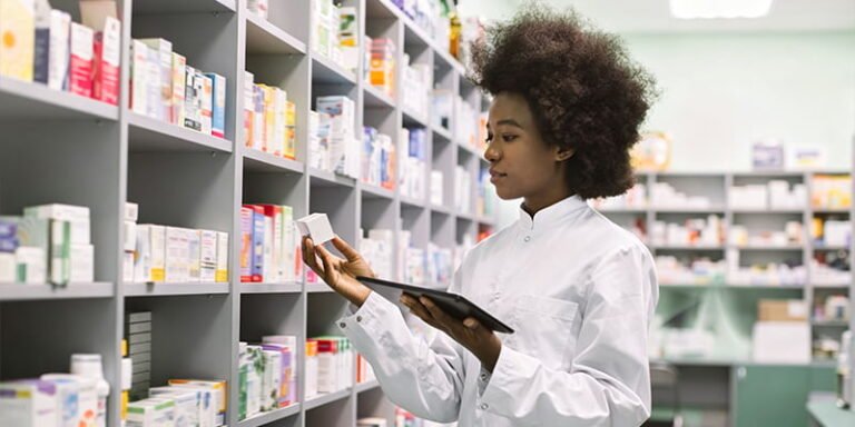 Buyer reviewing serum samples to choose a face serum manufacturer