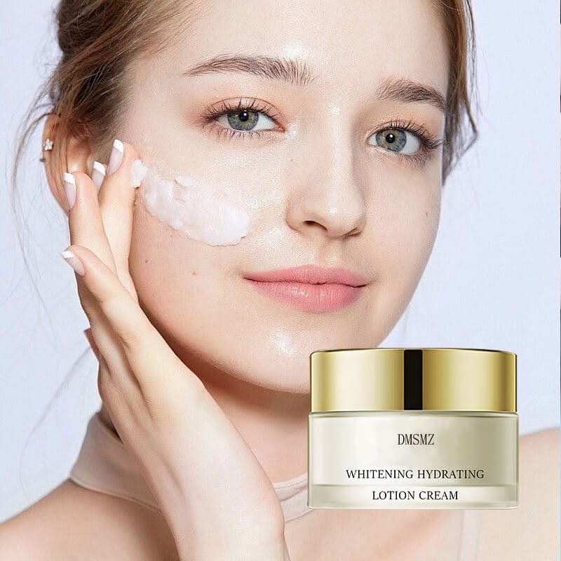 private-label-arbutin-brightening-cream-hero Private Label Arbutin Brightening Cream in a gold-lid jar with facial application
